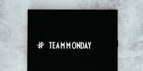 #team monday text overlay on black background