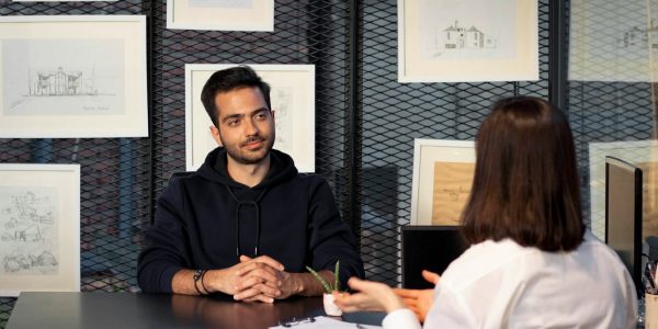 a man and a woman sitting at a table